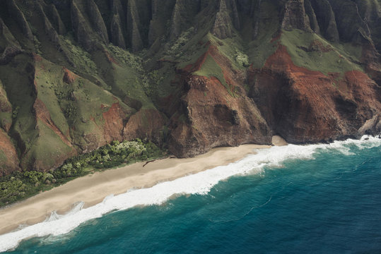 Na Pali Coast mountains and ocean in Kauai Hawaii - Powered by Adobe
