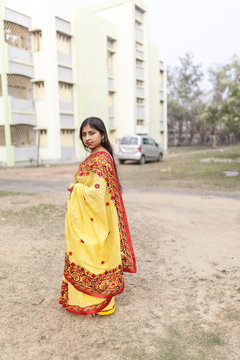 Indian woman with traditional dress,smiling and looking at camera