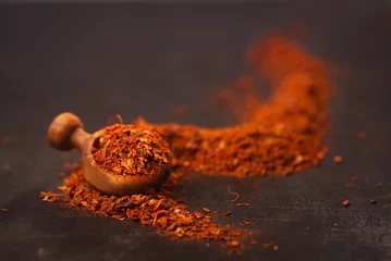 Rolgordijnen Traditional  harissa spice mix - morrocan red hot chilles mixed © Elena Moiseeva