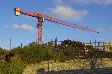 Fototapeta na wymiar An example of a Static Tower Crane in use on a construction project at Ballyholme County Down Northern Ireland in January 2018