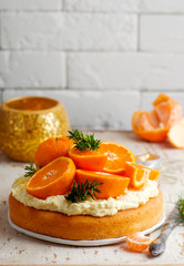 fresh tangerine cake with cream cheese frosting.
