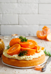 fresh tangerine cake with cream cheese frosting.
