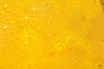 Photo sur Plexiglas Bière Close up of beer bubbles and foam as a background