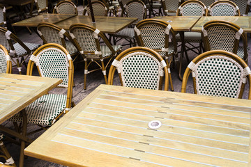 empty tables in outdoor cafe in Troyes city