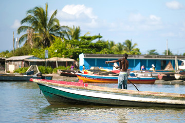 Fototapeta na wymiar Old wooden boats in Jamaica shore