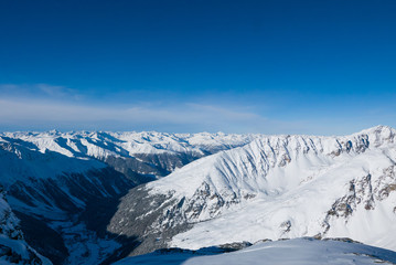 Fototapeta na wymiar Winter landscape of Alpine mountain range. Solda, South Tyrol, Italy