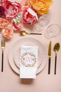 Table settings with embroidered napkin with the word LOVE"able """able set"