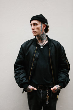 Gothic punk man with tattoos