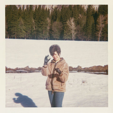 Woman holding a snowball in Yosemite -1967