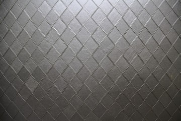 Background image consisting of diamond shape leather.