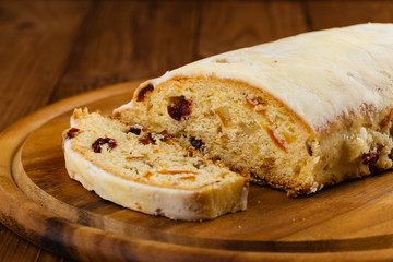 Traditional German christmas stollen fruit cake or homemade sweet bread