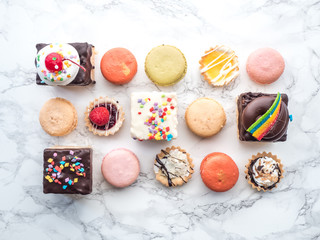 Chocolate covered rice crispies, tarts, and macaroons from bakery