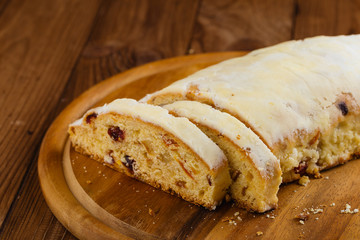 Traditional German christmas stollen fruit cake or homemade sweet bread