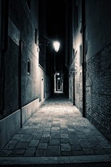 An empty alley somewhere in the city of Venice, Italy.