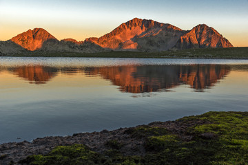 Sunset landscape with Kamenitsa peak and Tevno lake, Pirin Mountain, Bulgaria
