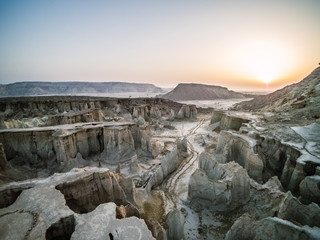 aerial view of rugged desert landscape at sunset, queshm island,