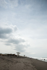 Pacific ocean beach in Champerico, Retalhuleu, Guatemala, Dramatic clouds and intense surge.