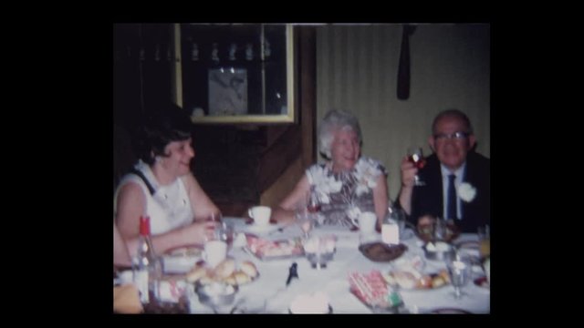 1966 Family toasts elderly couple on their 50th Anniversary