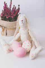 Easter background with Easter eggs and Heather flowers blossom Easter Bunny 
