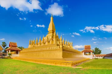 Fotobehang View of the Pha That temple. Vientiane, Laos. Panorama © Olga Khoroshunova