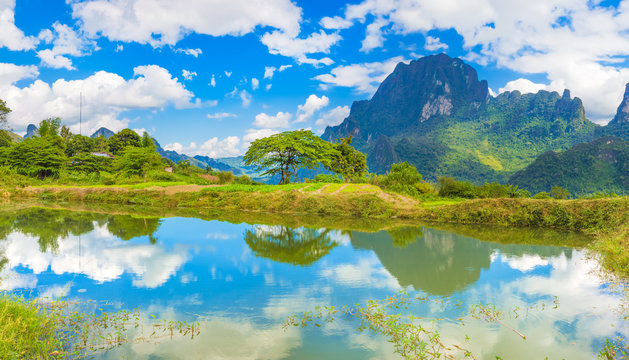 Beautiful landscape, pond on the foreground. Laos.