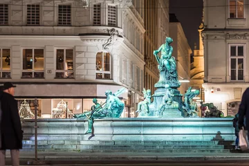 Zelfklevend Fotobehang Donnerbrunnen fountain in Vienna in Christmas time © Alexey Fedorenko