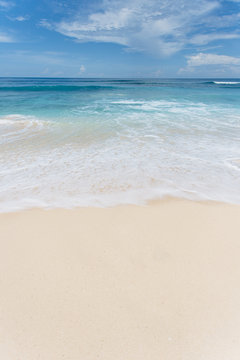 White sand beach with blue cyan water