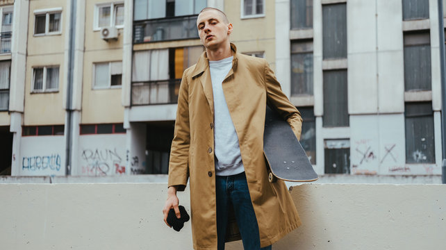 Portrait of young hip adoslecent guy /skinhead/punk subculture.