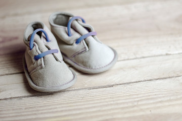 Fototapeta na wymiar Baby new born shoes