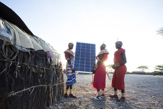 Samburu women with solar panel. Kenya.