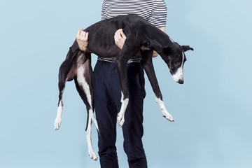 Man holding dog
