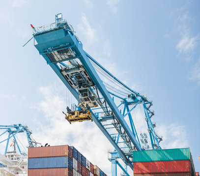 Shipping containers and a container crane