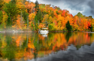 Ricker pond in Vermont with fall foliage