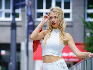 Blonde woman in city