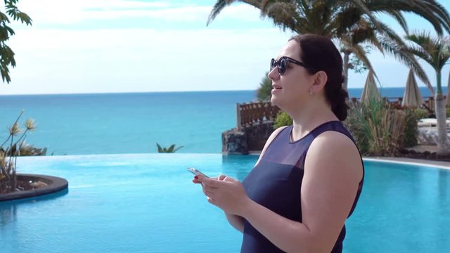 High quality video of woman using mobile phone in 4K