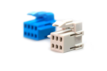 One blue and one white connector isolated on white background