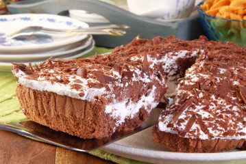 Closeup of a sliced boston chocolate cake