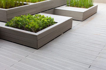Outdoor planter with green planting