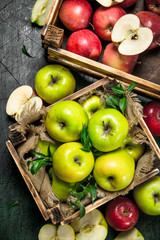 Fresh apples in boxes.