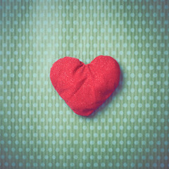 Valentine's Day. Colorful knitted hearts. Valentines day. Heart pendant. Vintage background in peas. Red heart. Handmade Hearts. Valentine cards. Space for text. Toned image.
