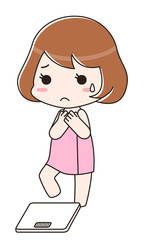 お風呂上りにおそるおそる体重計に乗ろうとする女性