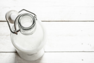 Fresh milk in bottle .