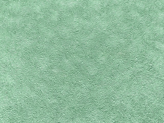 Texture of green wallpaper with a pattern