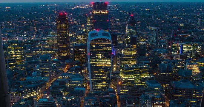 London,England,UK &ndash; July 2015 : Timelapse of central London at night with view of The Gherkin, The Leadenhall, Regus and Willis Towers Watson buildings