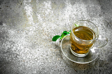 Green tea in a glass cup.