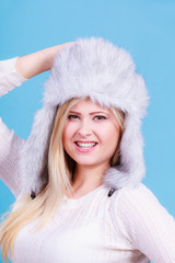 Blonde woman in winter furry hat