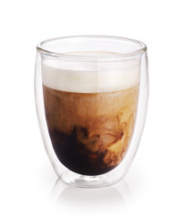 Hot coffee with milk in a glass with double walls isolated on white background.