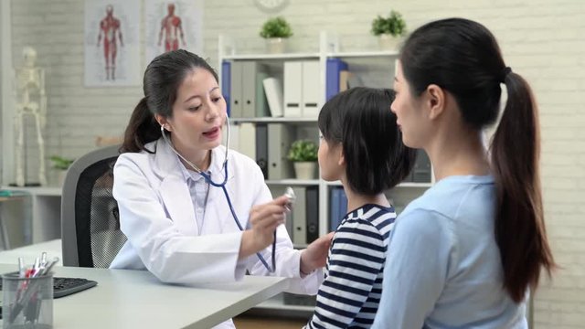 doctor using stethoscope to test listening