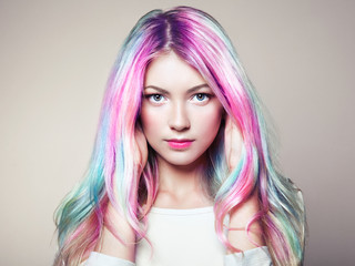 Beauty Fashion Model Girl with Colorful Dyed Hair. Girl with perfect Makeup and Hairstyle. Model with perfect Healthy Dyed Hair. Rainbow Hairstyles