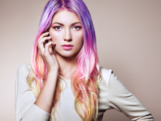 Beauty Fashion Model Girl with Colorful Dyed Hair. Girl with perfect Makeup and Hairstyle. Model with perfect Healthy Dyed Hair. Rainbow Hairstyles